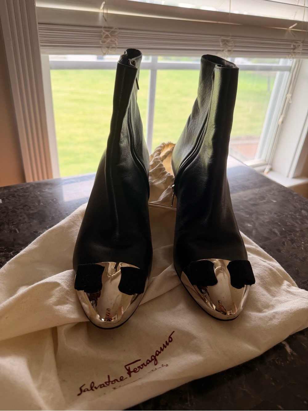 Salvatore Ferragamo Black Leather Ankle Boots with Silver Cap Toe and Bow